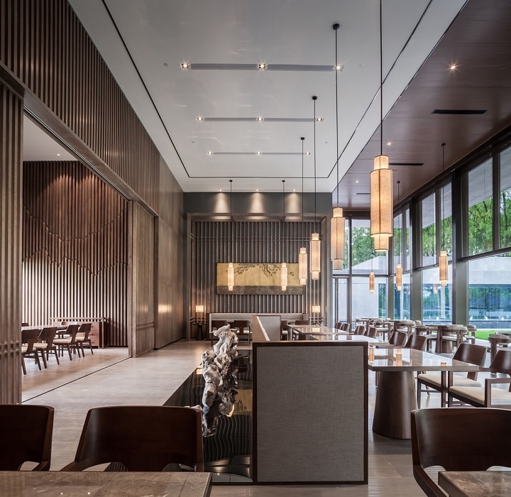 休閑茶樓裝修效果圖—現代門(mén)樓，曲折圓潤的中式藝術(shù)裝置